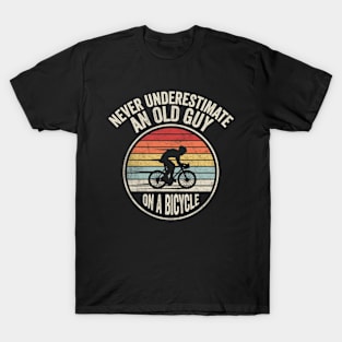 Never Underestimate An Old Guy On A Bicycle Funny Cycling Vintage Biker Cyclist Dad Gift Biker Gift Retro Bike T-Shirt